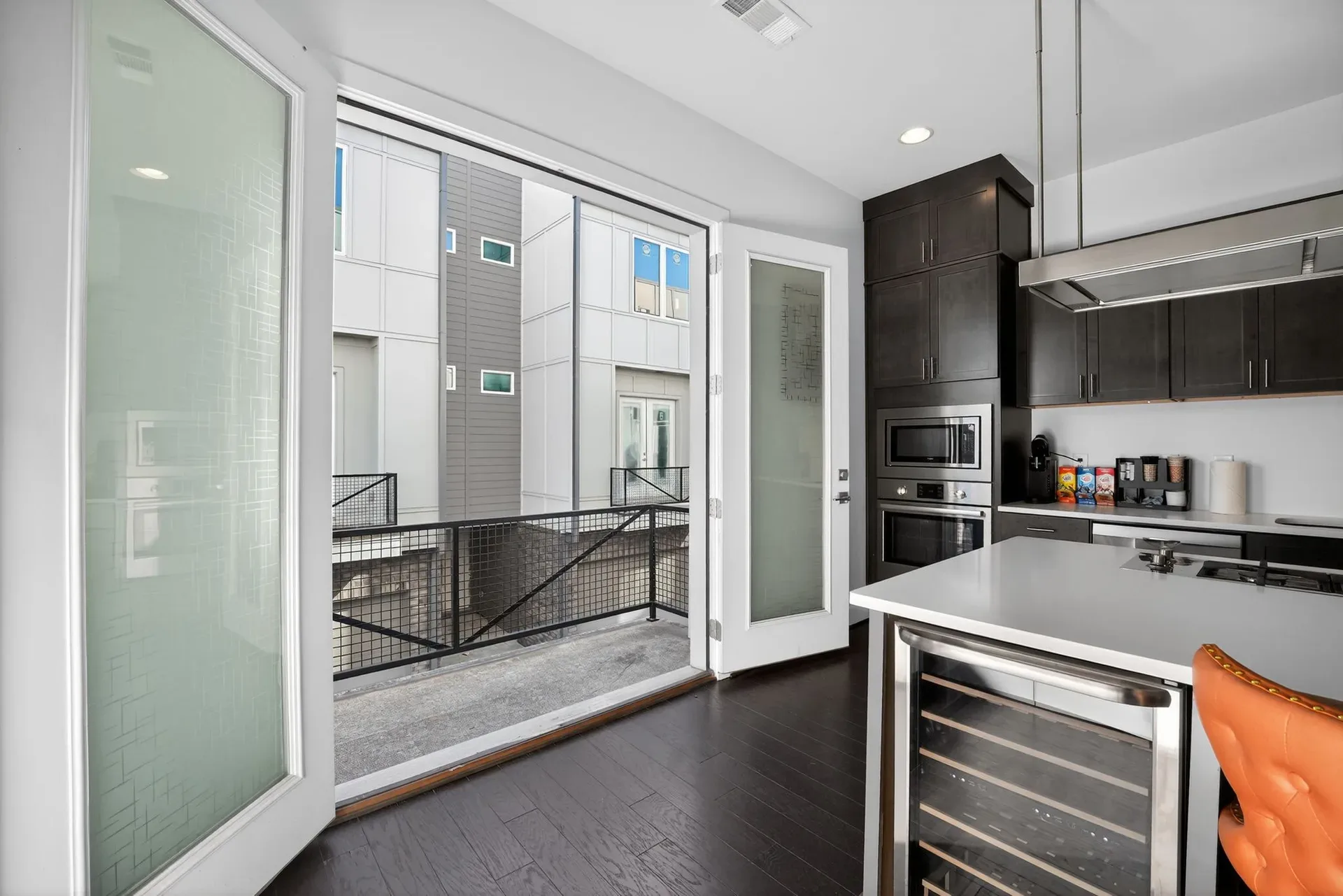 Kitchen to the balcony at 241 Maynard Terrace