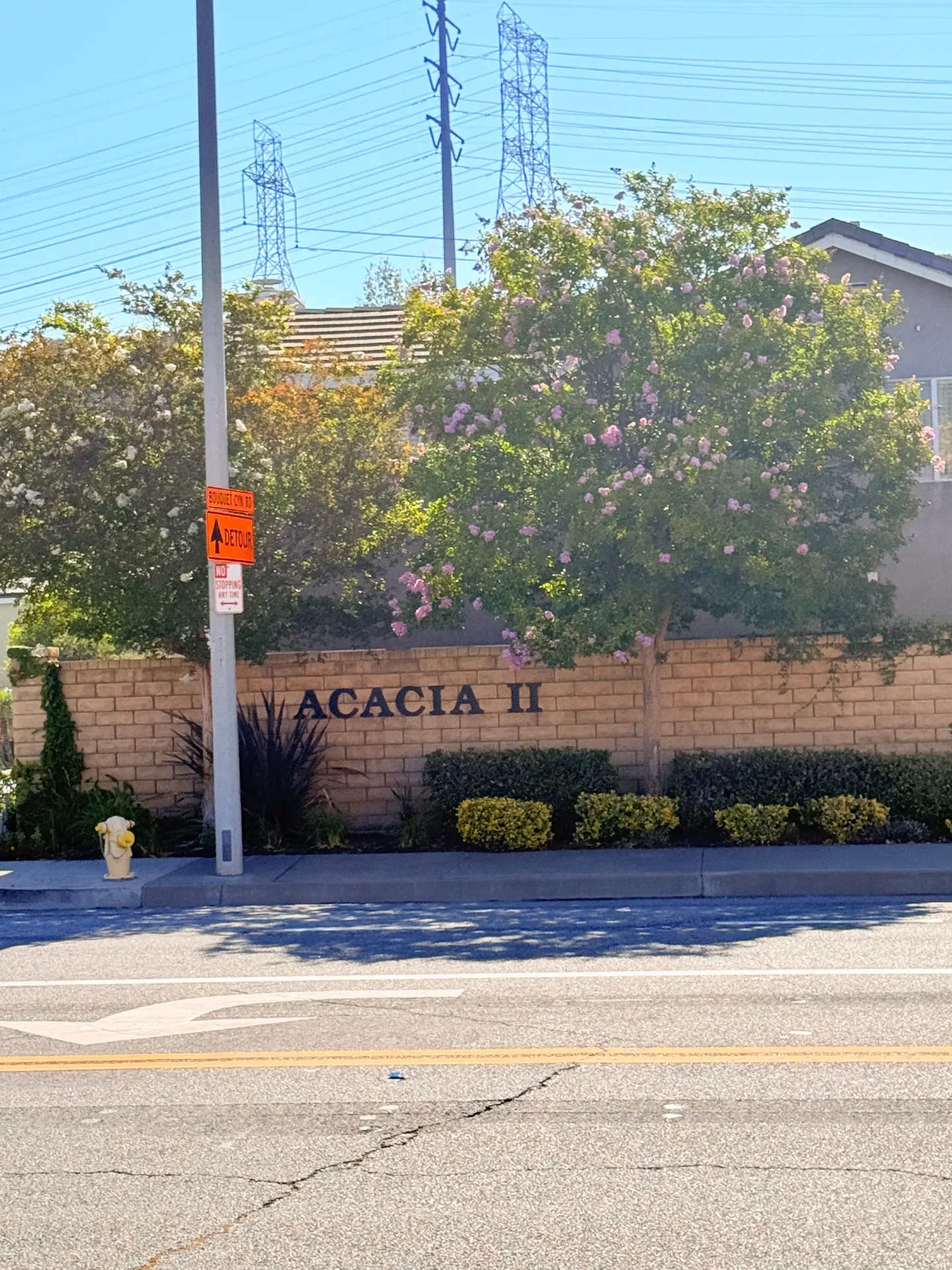 The Acacia II community monument wall