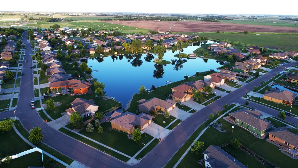 Aerial view of Tea, South Dakota showing residential neighborhoods around the lake