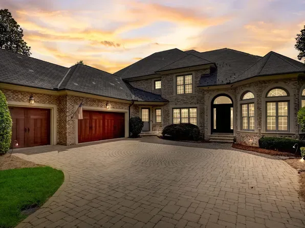 Traditional brick facade home in the Treyburn neighborhood of Durham NC