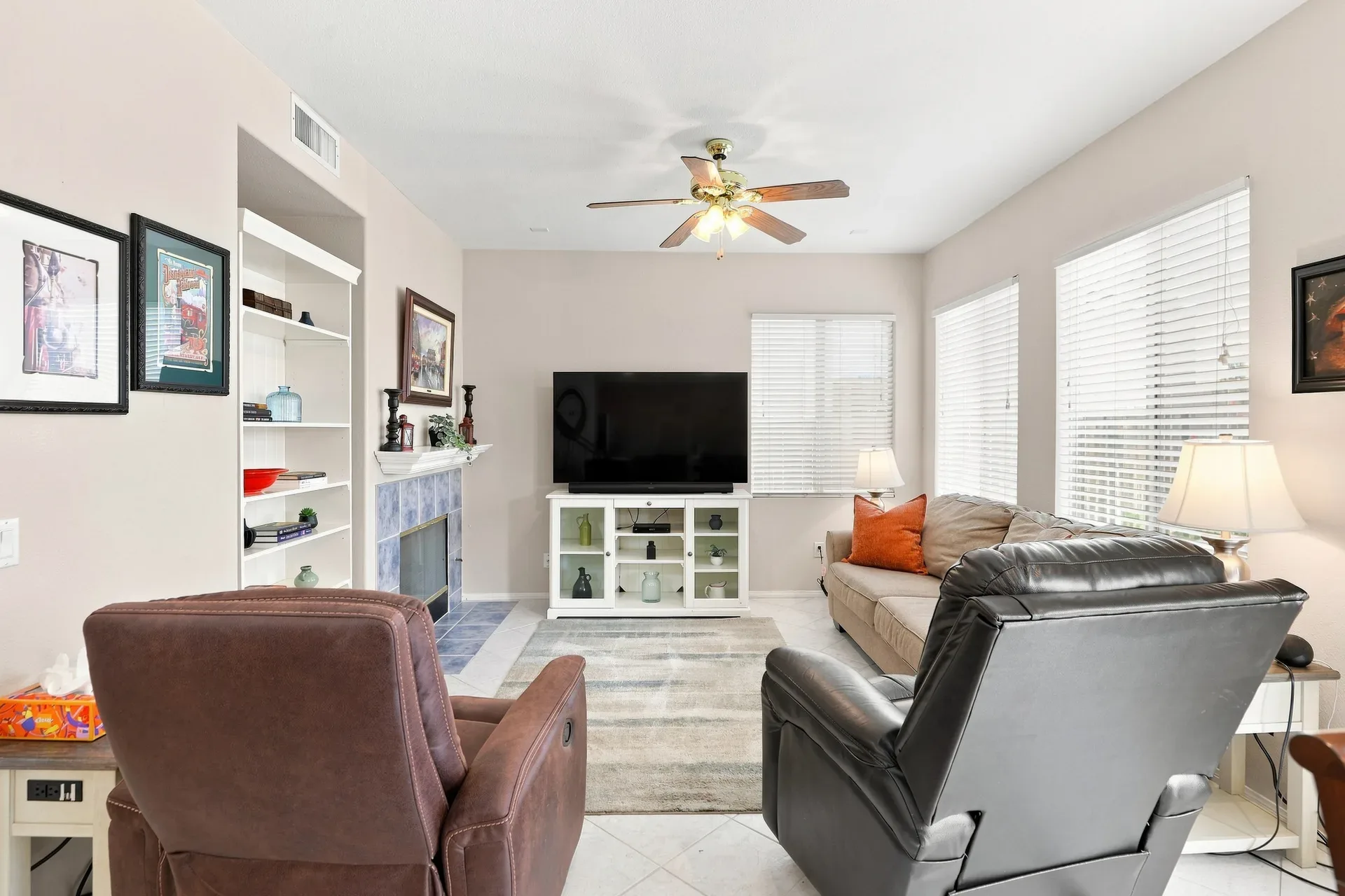 Living room in the 28282 Cedar Lane home in Saugus with a fireplace and comfortable seating