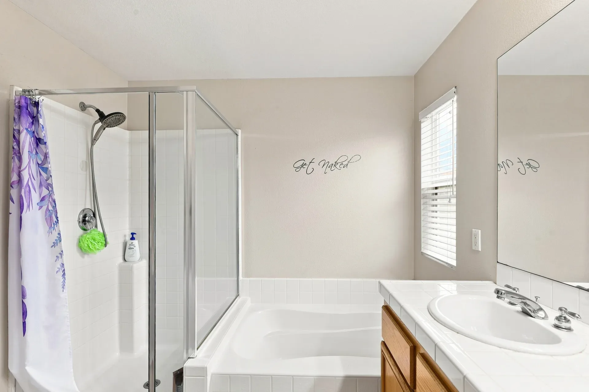 Bathroom with a tub and shower combo in the 28282 Cedar Lane home in Saugus