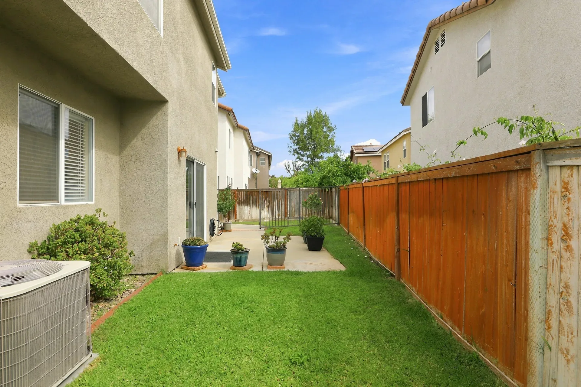 Backyard patio and lawn of the 28282 Cedar Lane home in Saugus