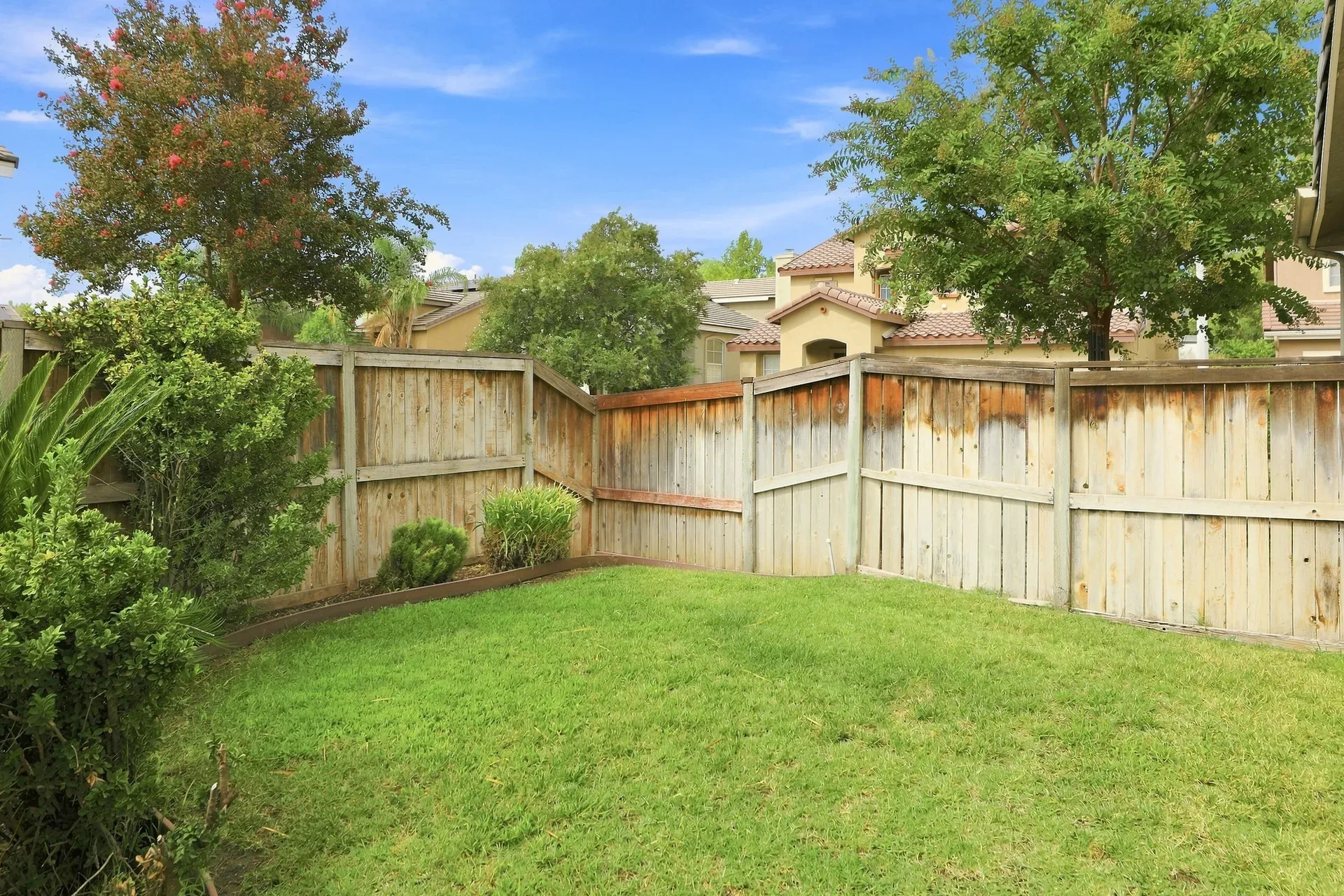 Grassy backyard and lawn of the 28282 Cedar Lane home in Saugus