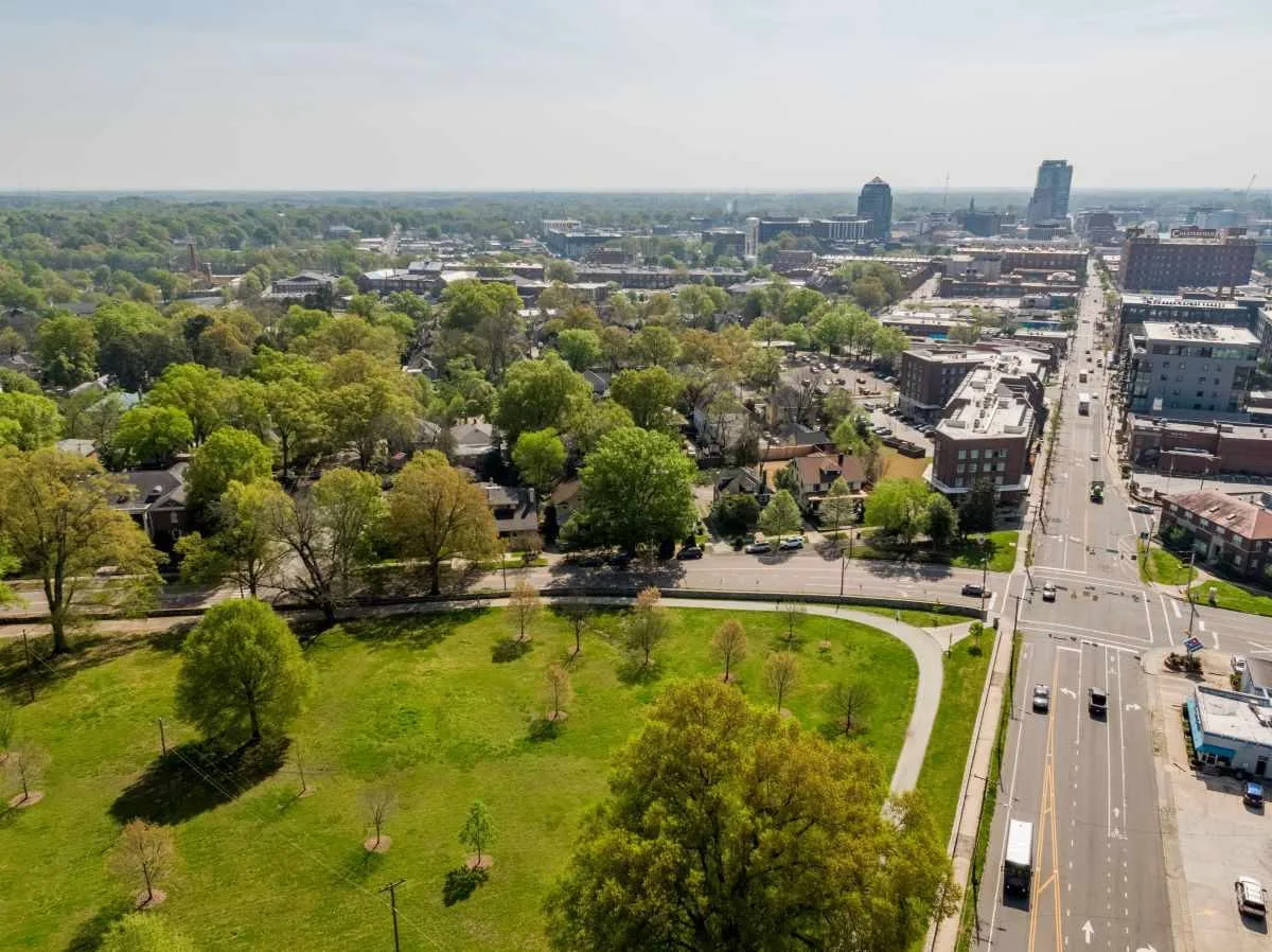 Aerial view of green space flowing toward downtown Durham near Trinity Park