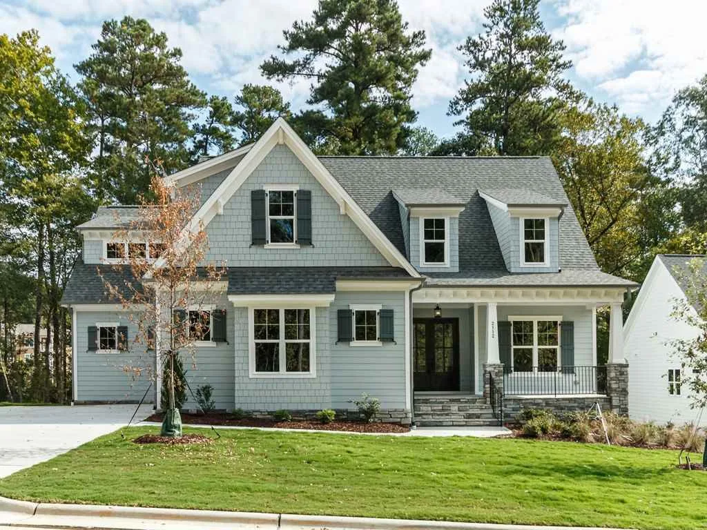 Traditional front exterior and facade of a home in Croasdaile, Durham NC