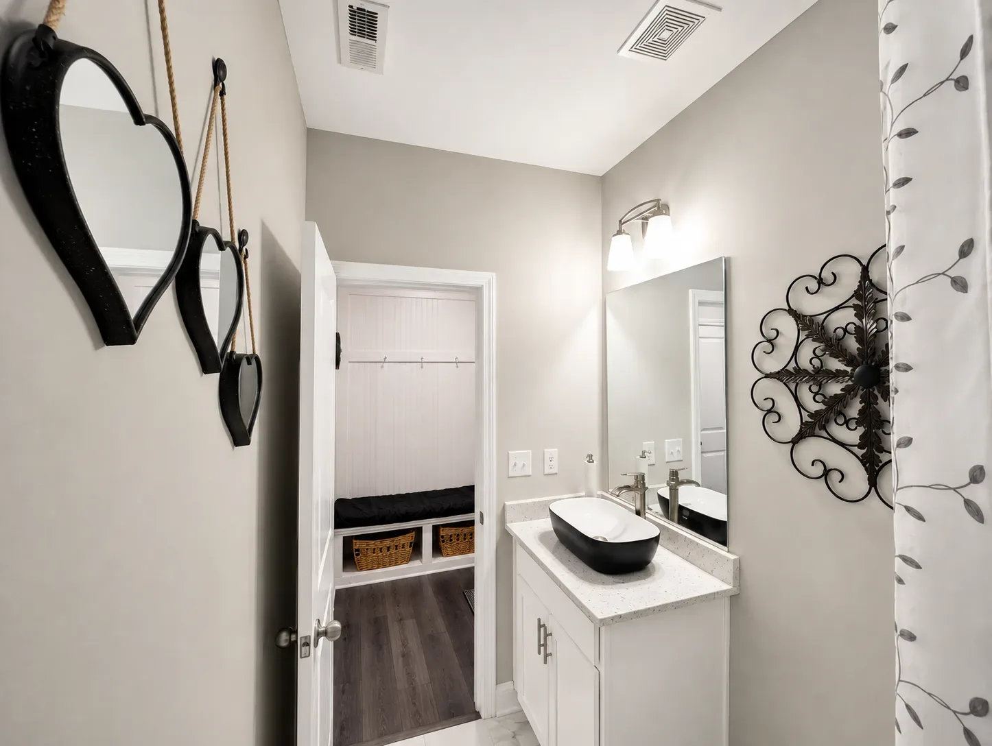 Guest bathroom vanity with a vessel sink