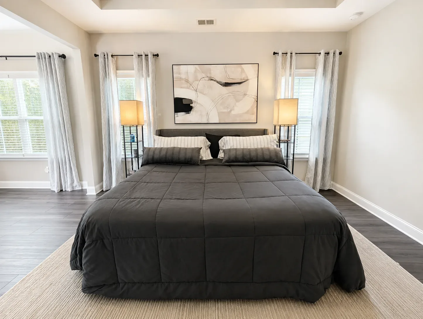 Primary bedroom with tray ceiling