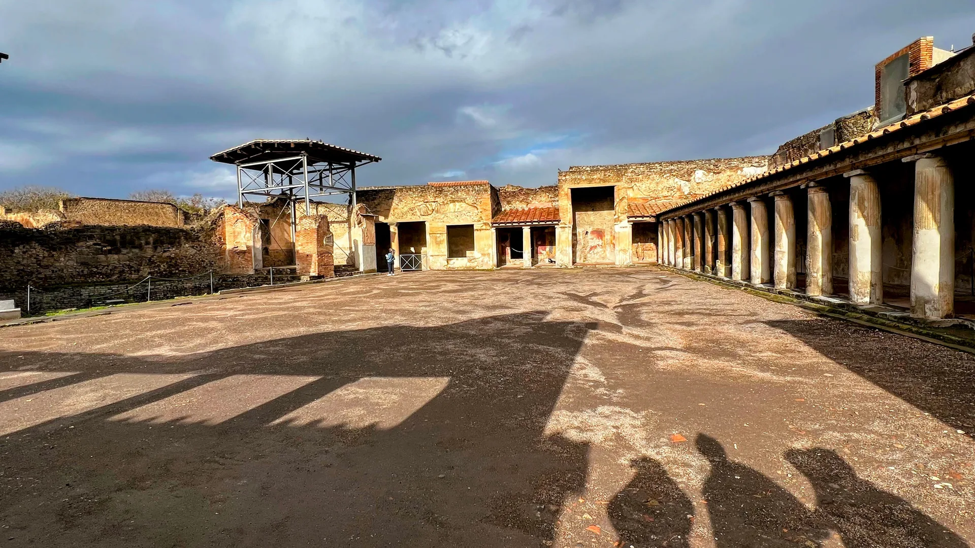 A columned courtyard in late afternoon light at Pompeii
