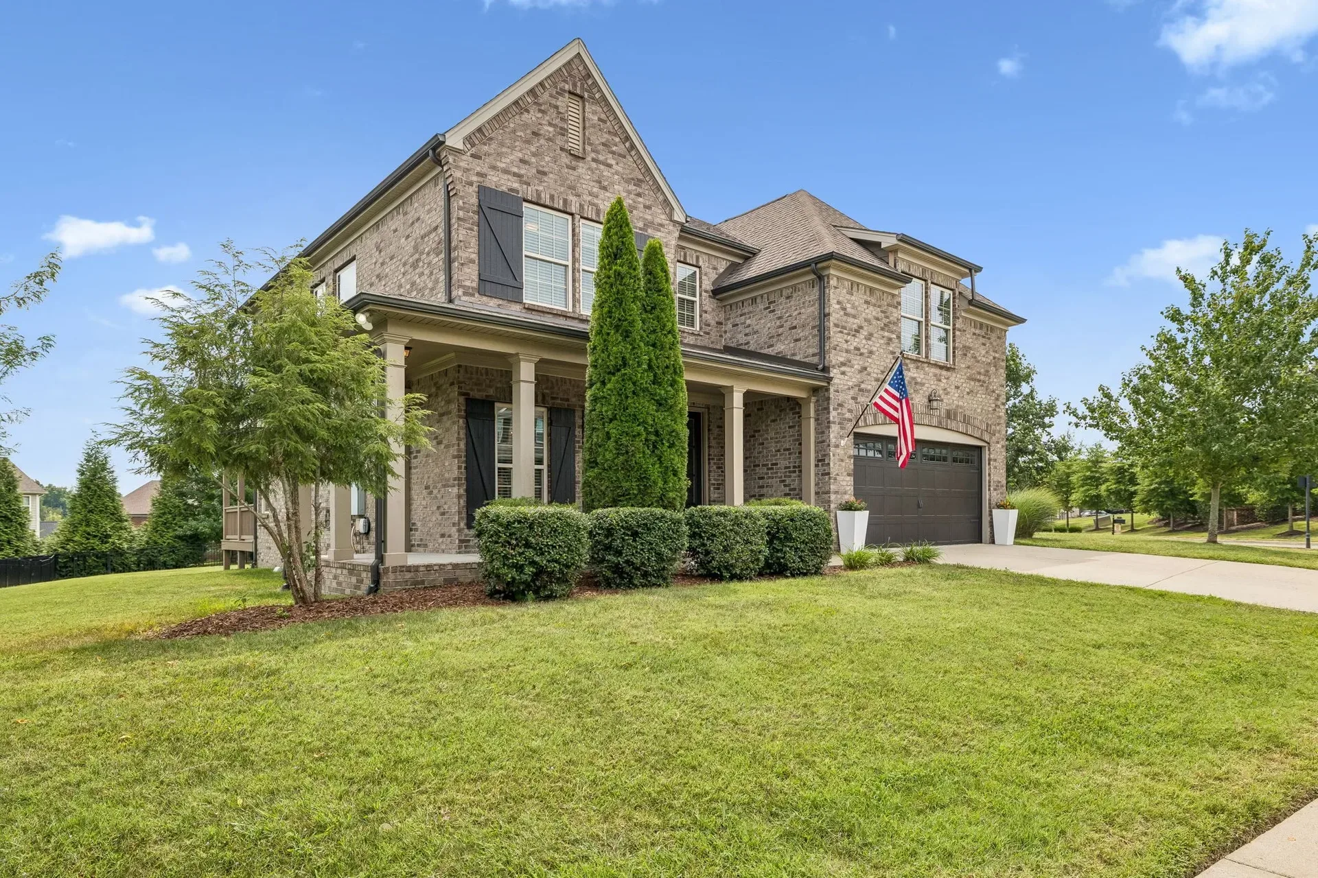 Traditional brick home facade in bright daylight