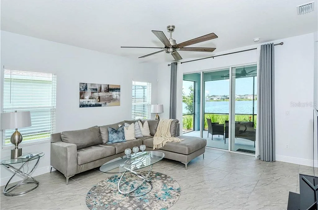 Bright living room with views toward the lake