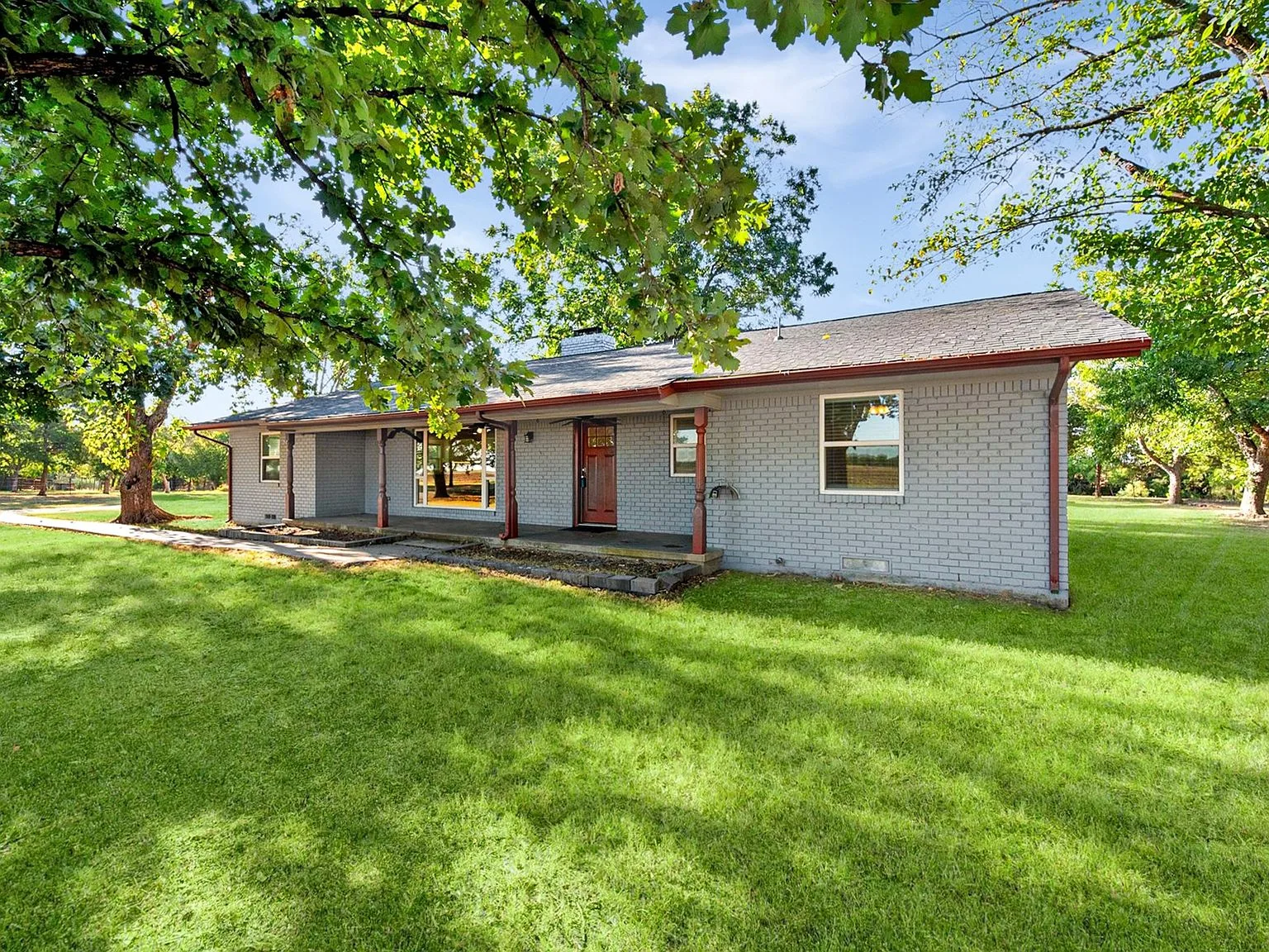 Front facade of the ranch home on a clear day