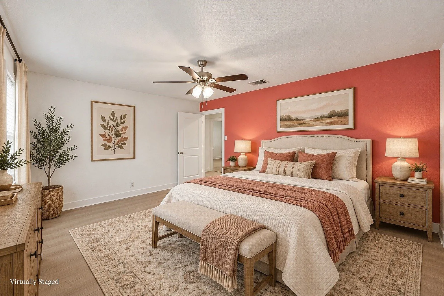 Primary bedroom with terracotta accent wall