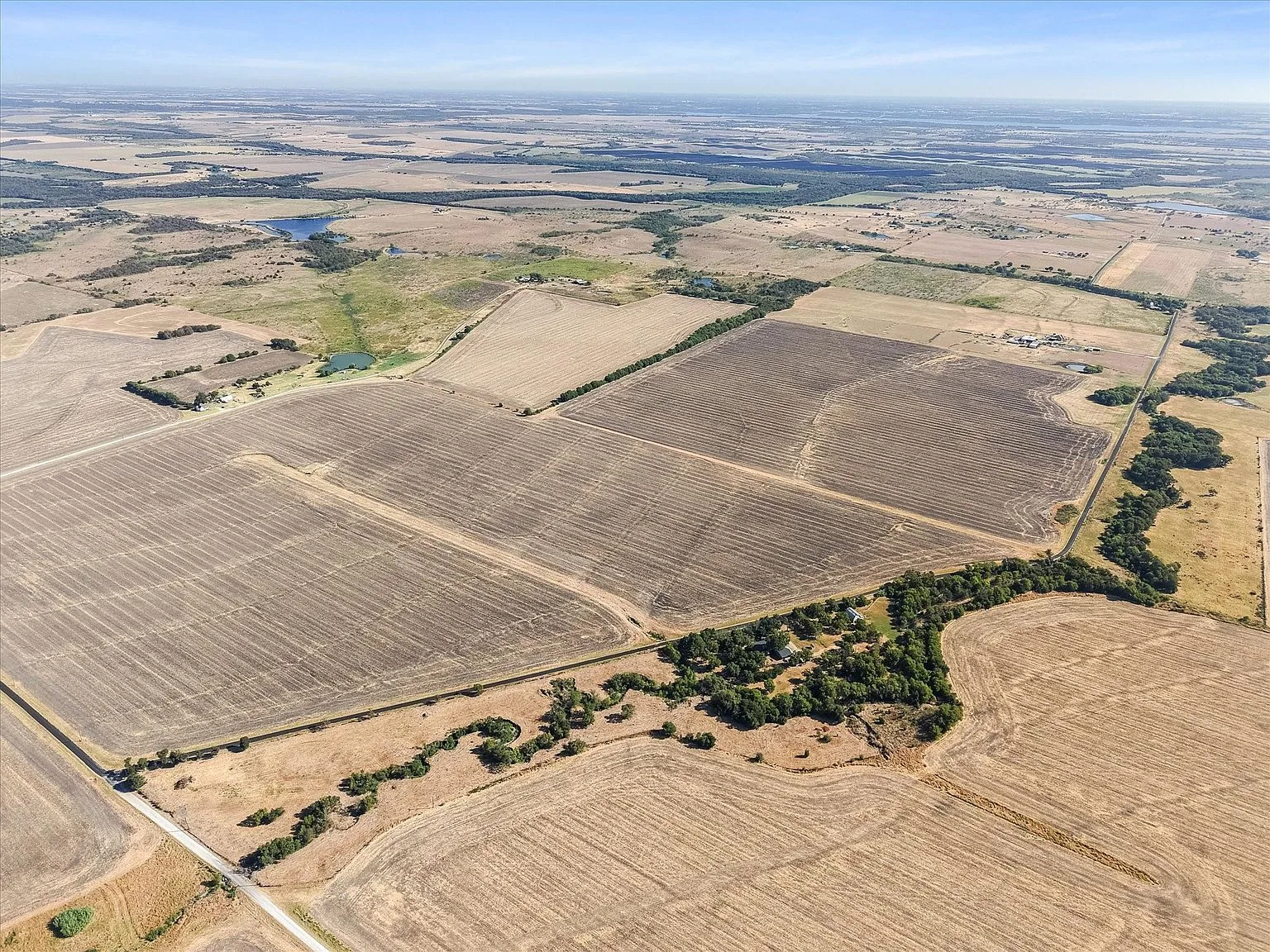 Aerial view of the creek line and fields on the tract