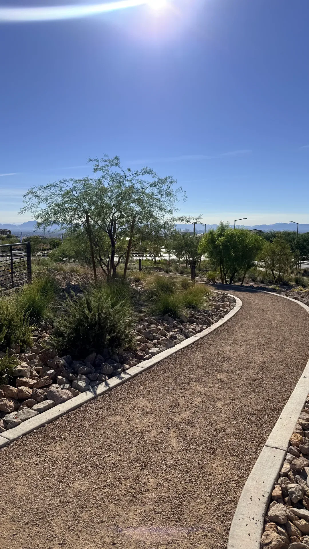 Winding gravel walking path through desert landscaping in Summerlin