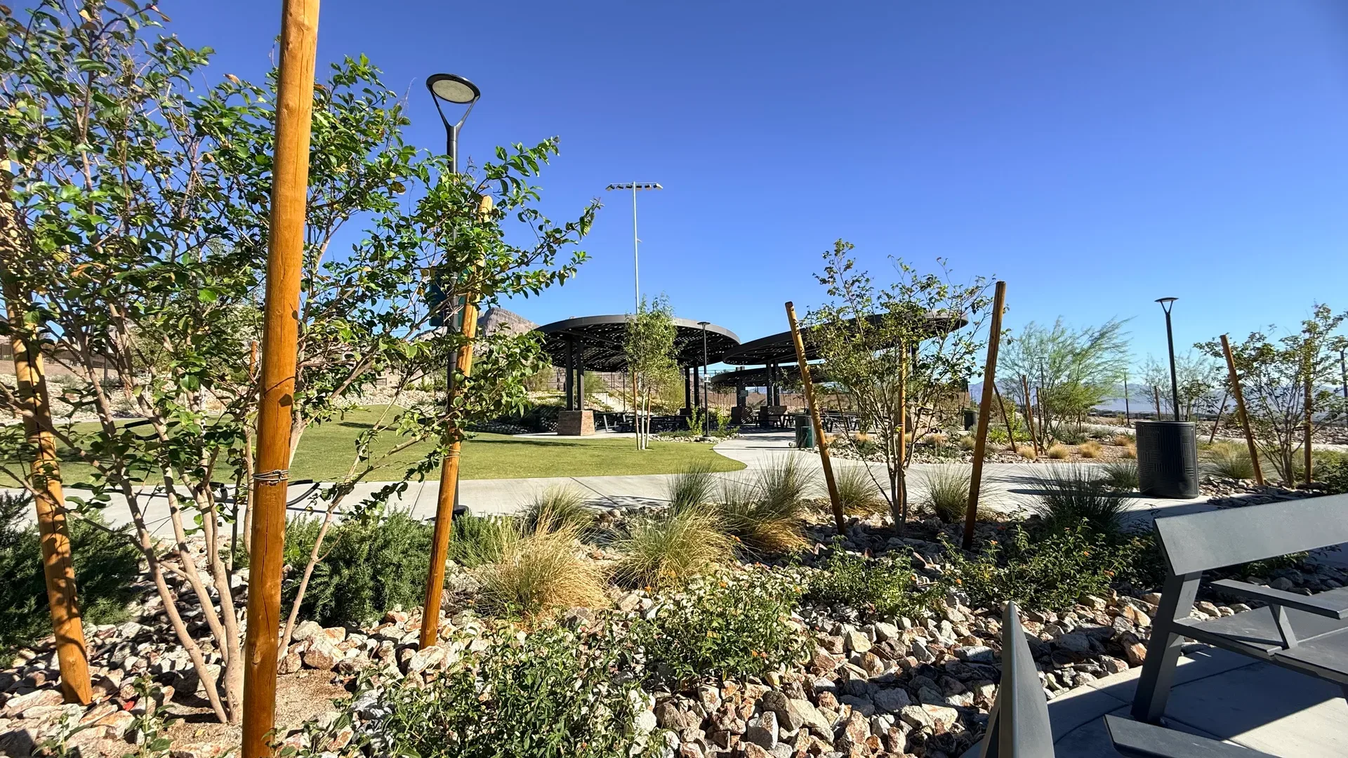 Community park with shaded pergolas and manicured lawns in Summerlin