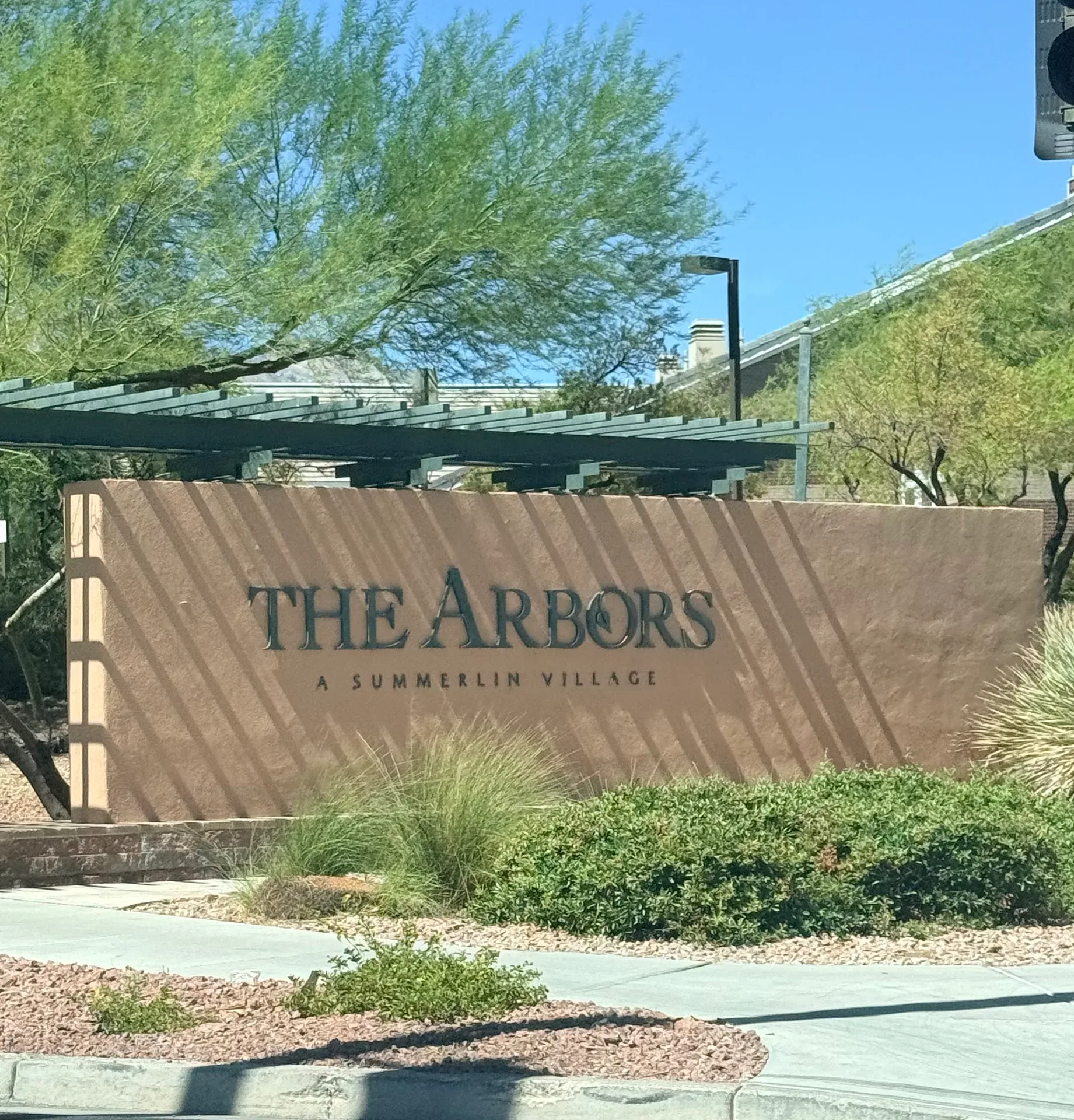 The Arbors community entrance sign