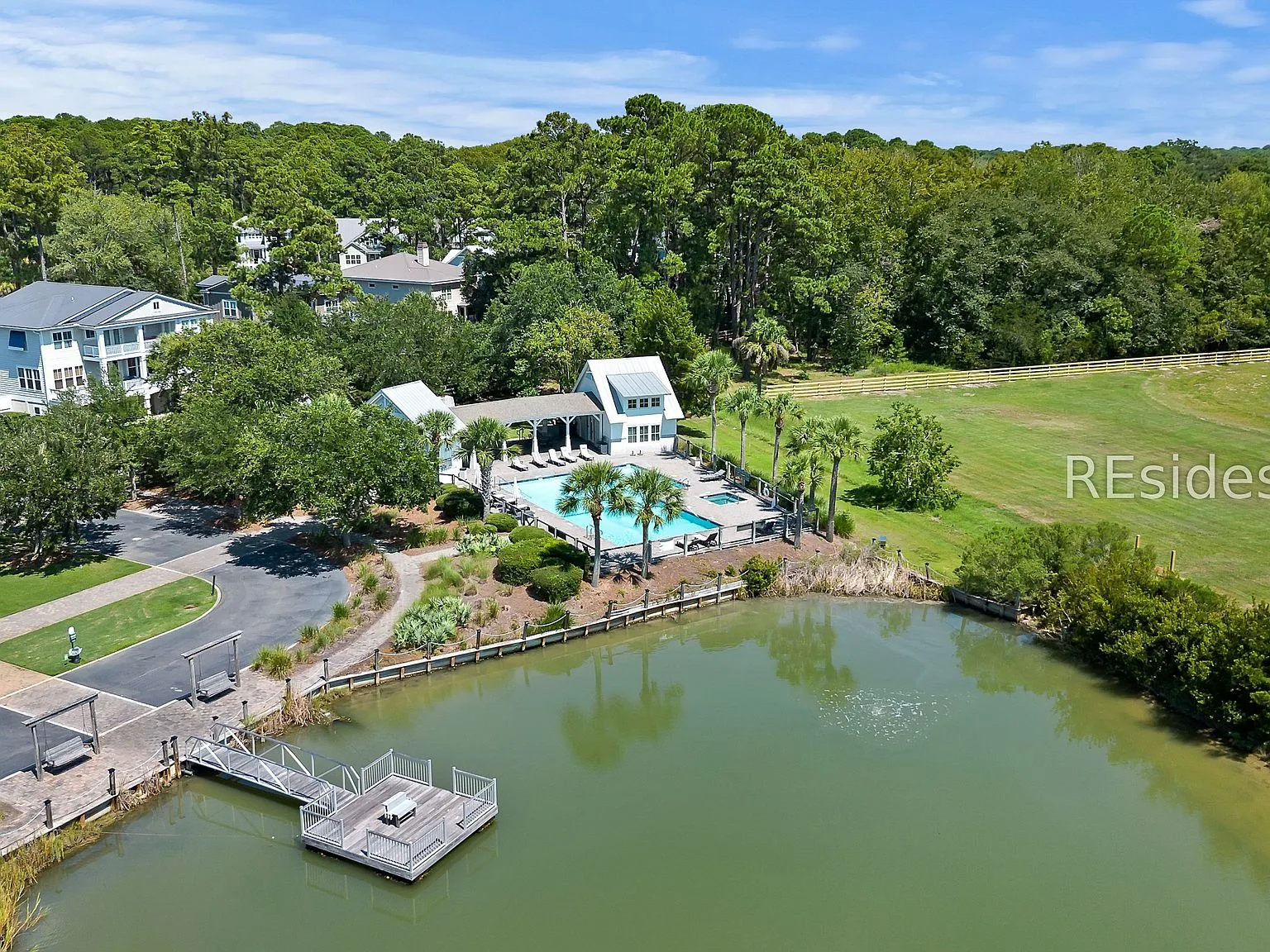 Aerial view of the community pool and Lake Russell in The Paddocks