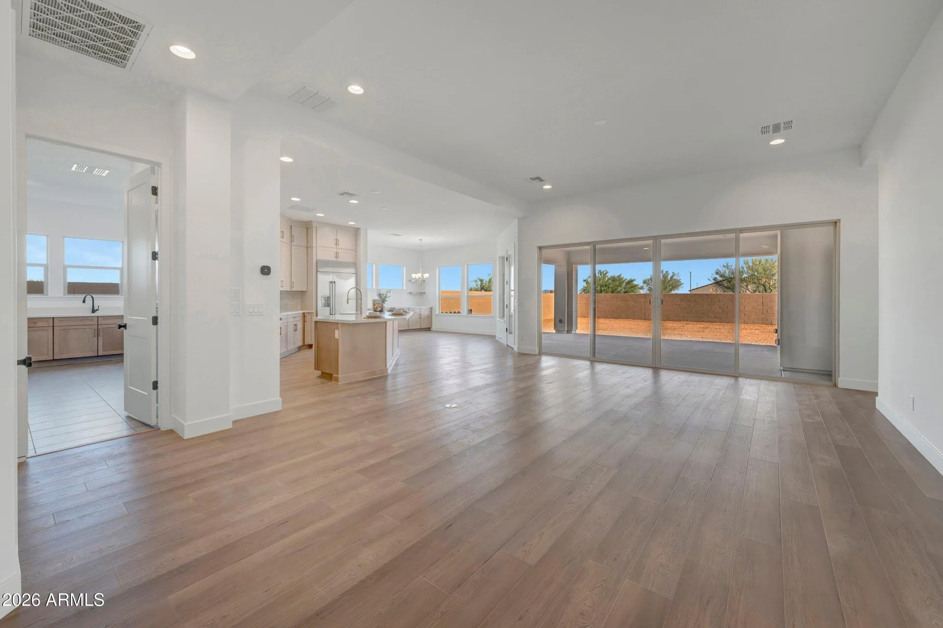An open-concept living area in a vacant Arizona home
