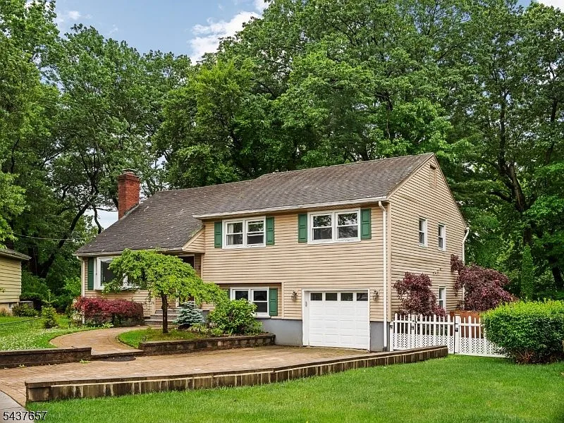 Exterior of 17 Ravine Ct, Clifton, NJ - a colonial-style home on a cul-de-sac