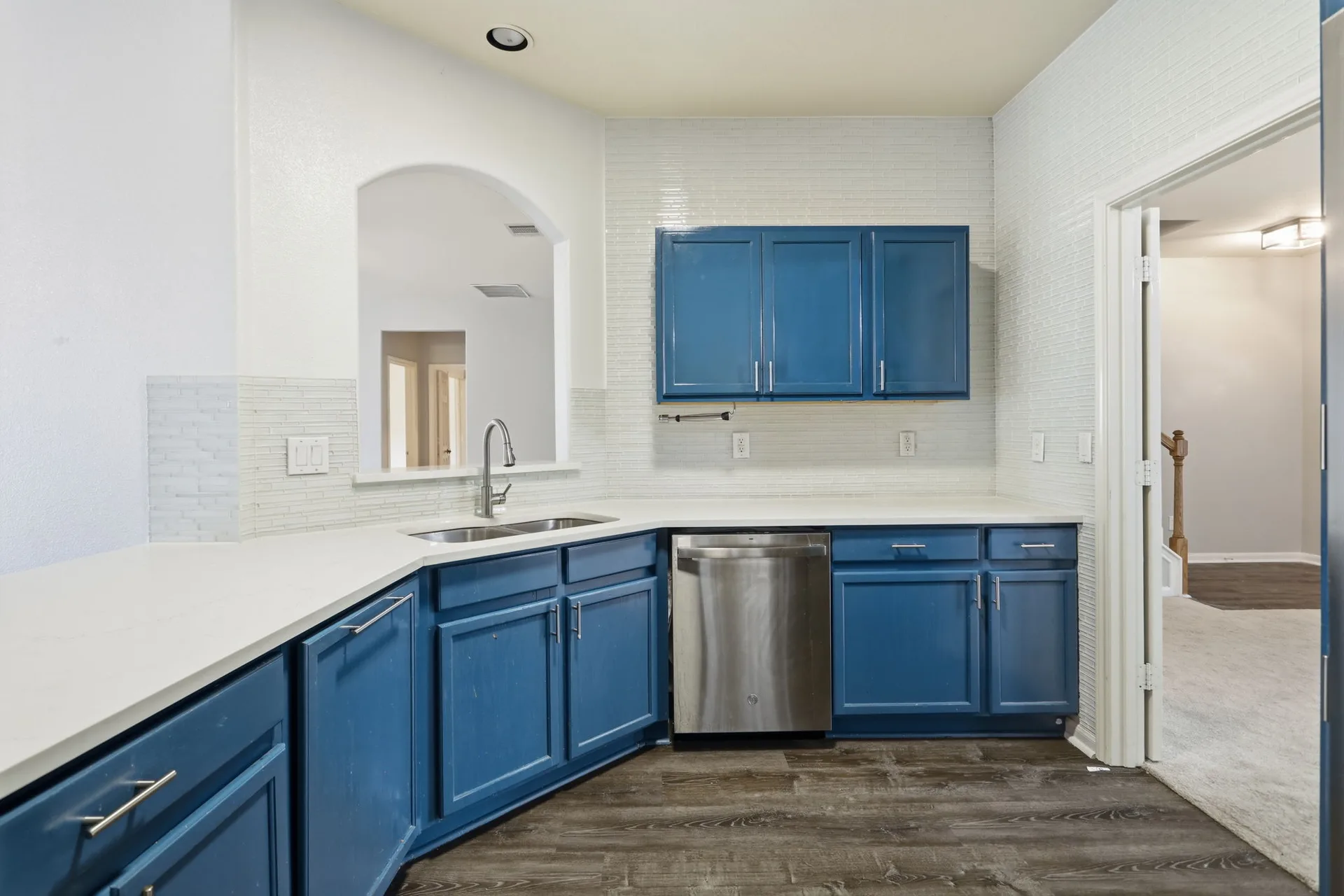 Kitchen prep area with subway tile