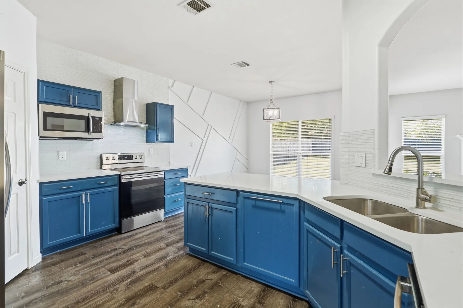 Kitchen island with blue cabinets