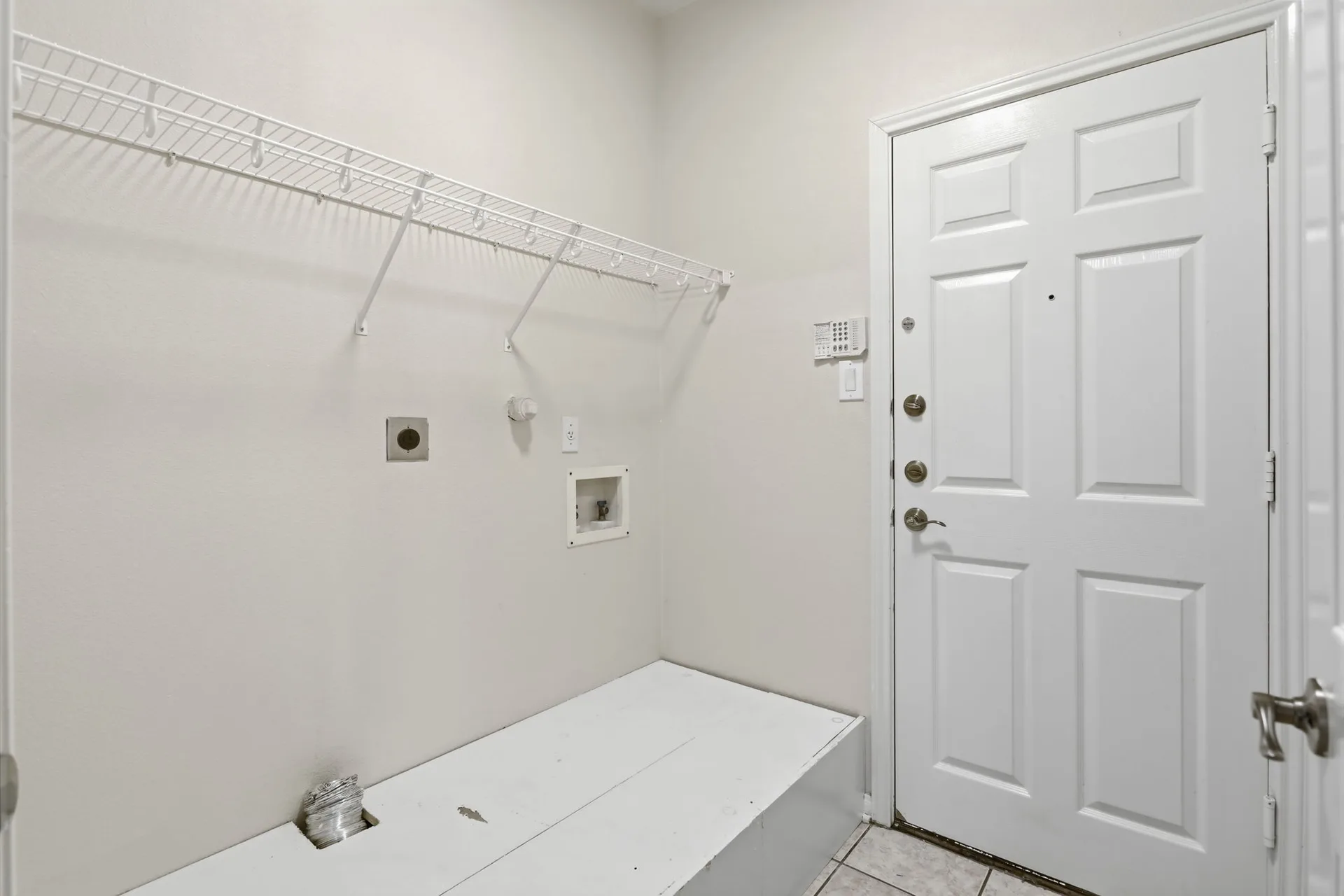 Laundry room with exterior access