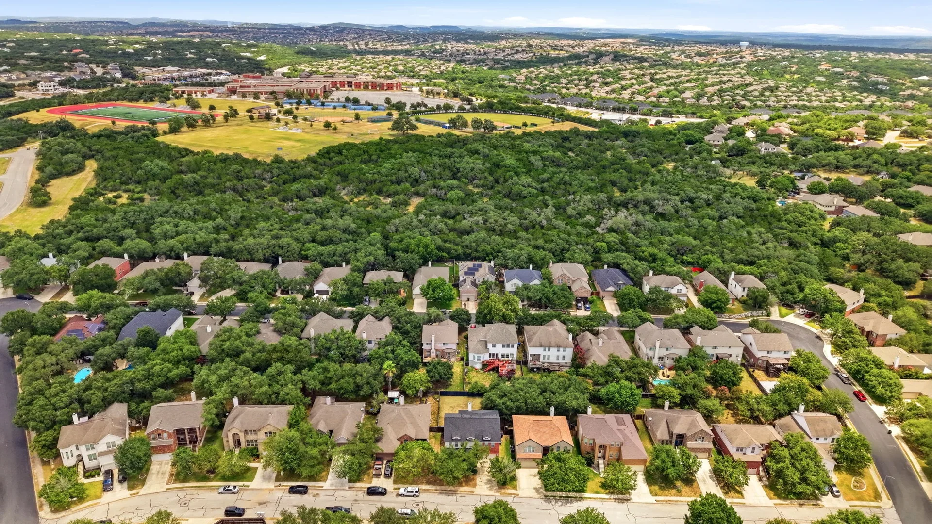 Aerial view of the neighborhood around 123 Impala Cir
