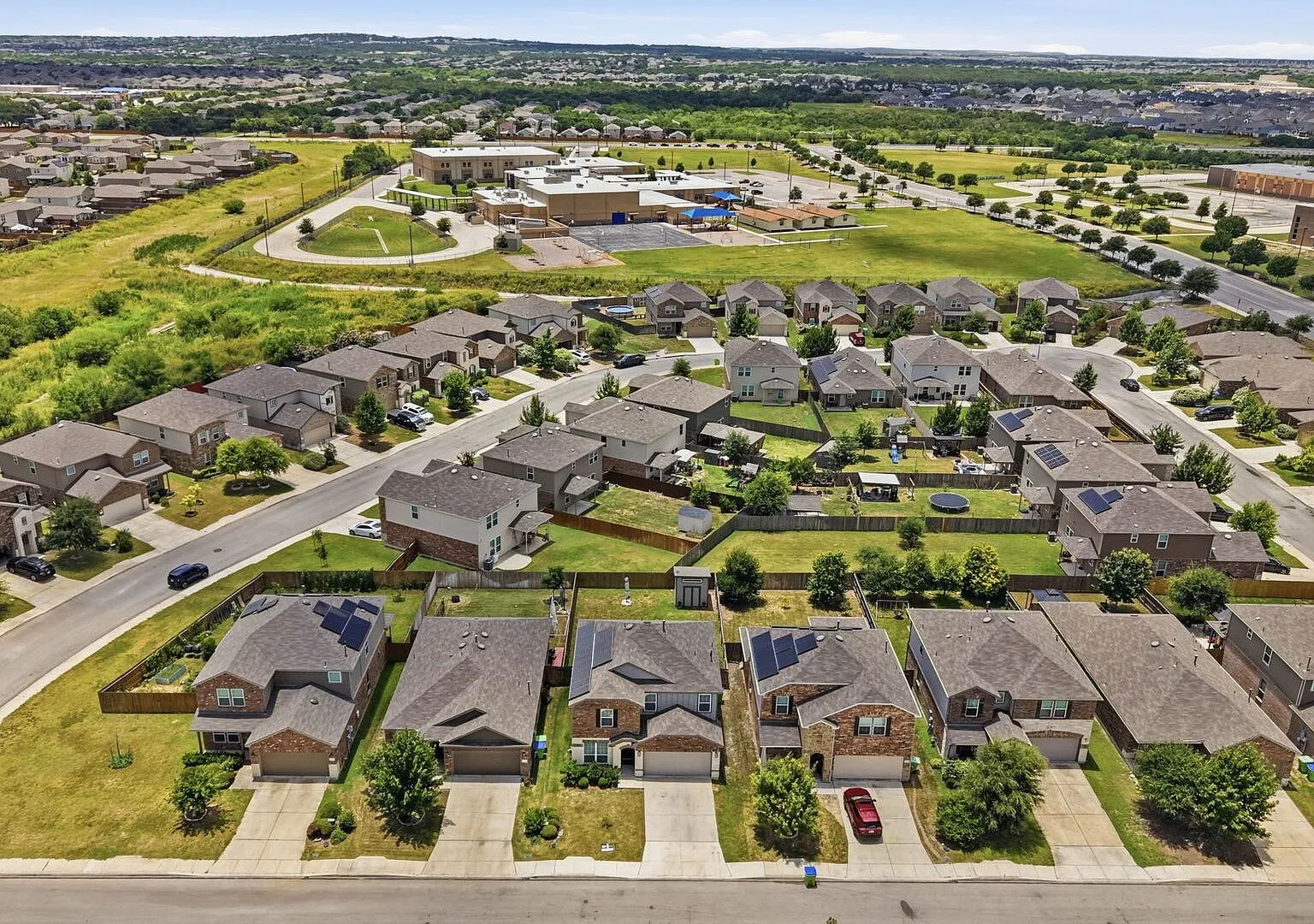 Aerial view of the suburban neighborhood around 12114 Wagon Cyn