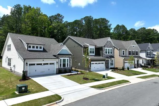 Suburban street row of homes near Friendship Station, Apex