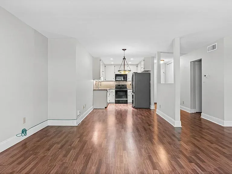 Freshly updated kitchen and dining view in the Bankers Hill unit