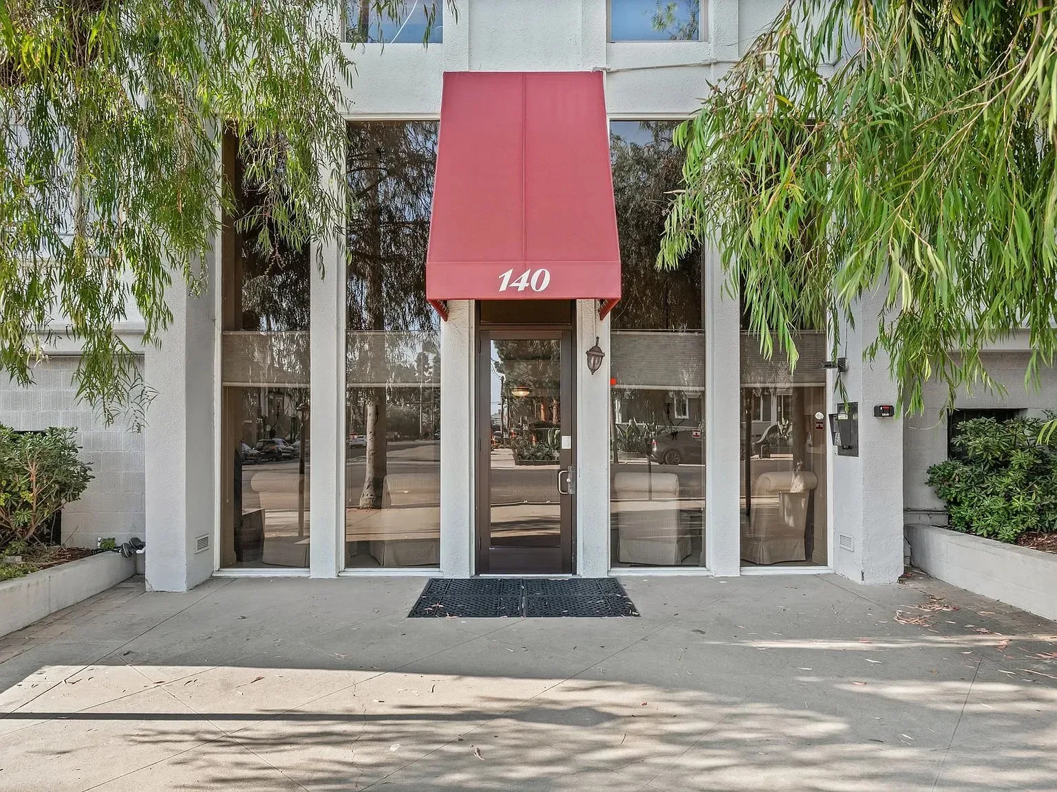 Building entrance and facade of 140 Walnut Ave in Bankers Hill