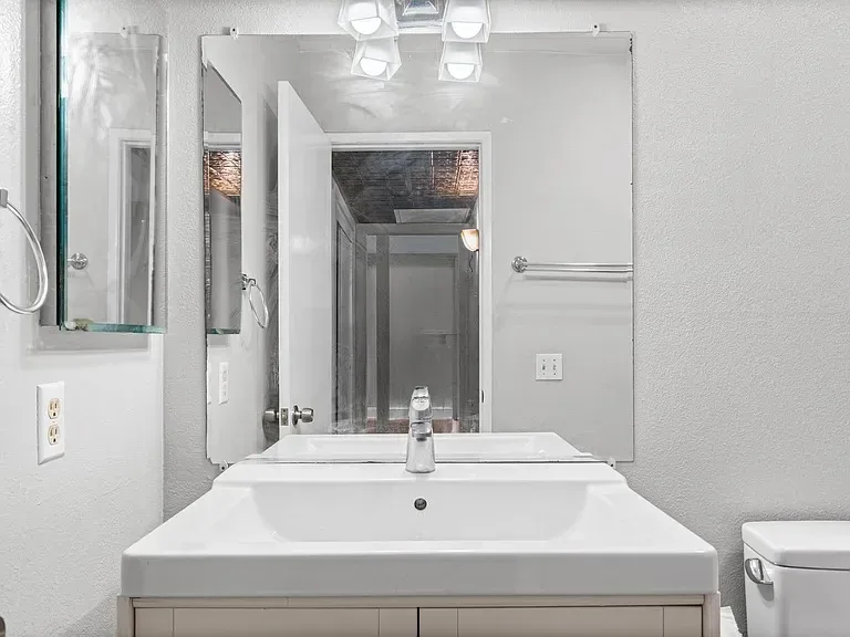 Bathroom vanity and sink at 140 Walnut Ave, Unit 2F