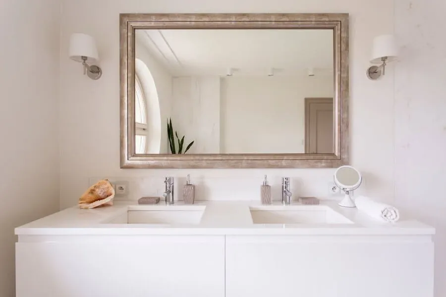Bathroom vanity installation in San Antonio: a modern white double-sink vanity freshly installed in a bright bathroom