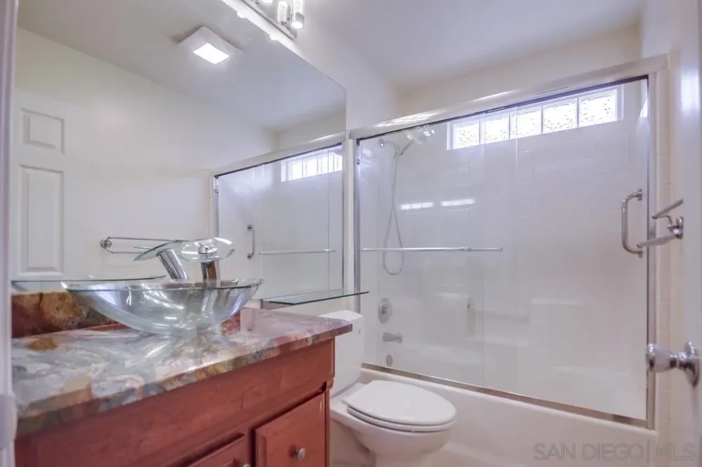 Bathroom with vessel sink at the Lobelia Road home in Alpine