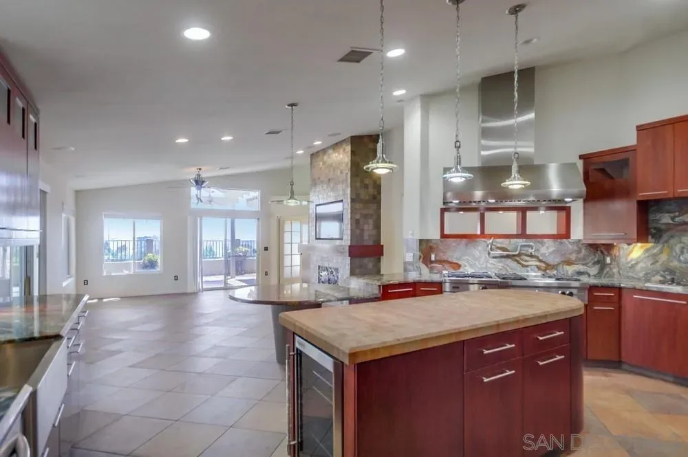 Chef's kitchen with cherry wood island at the Alpine home