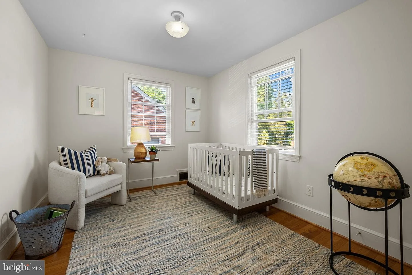 Nursery bedroom with crib and bright daylight