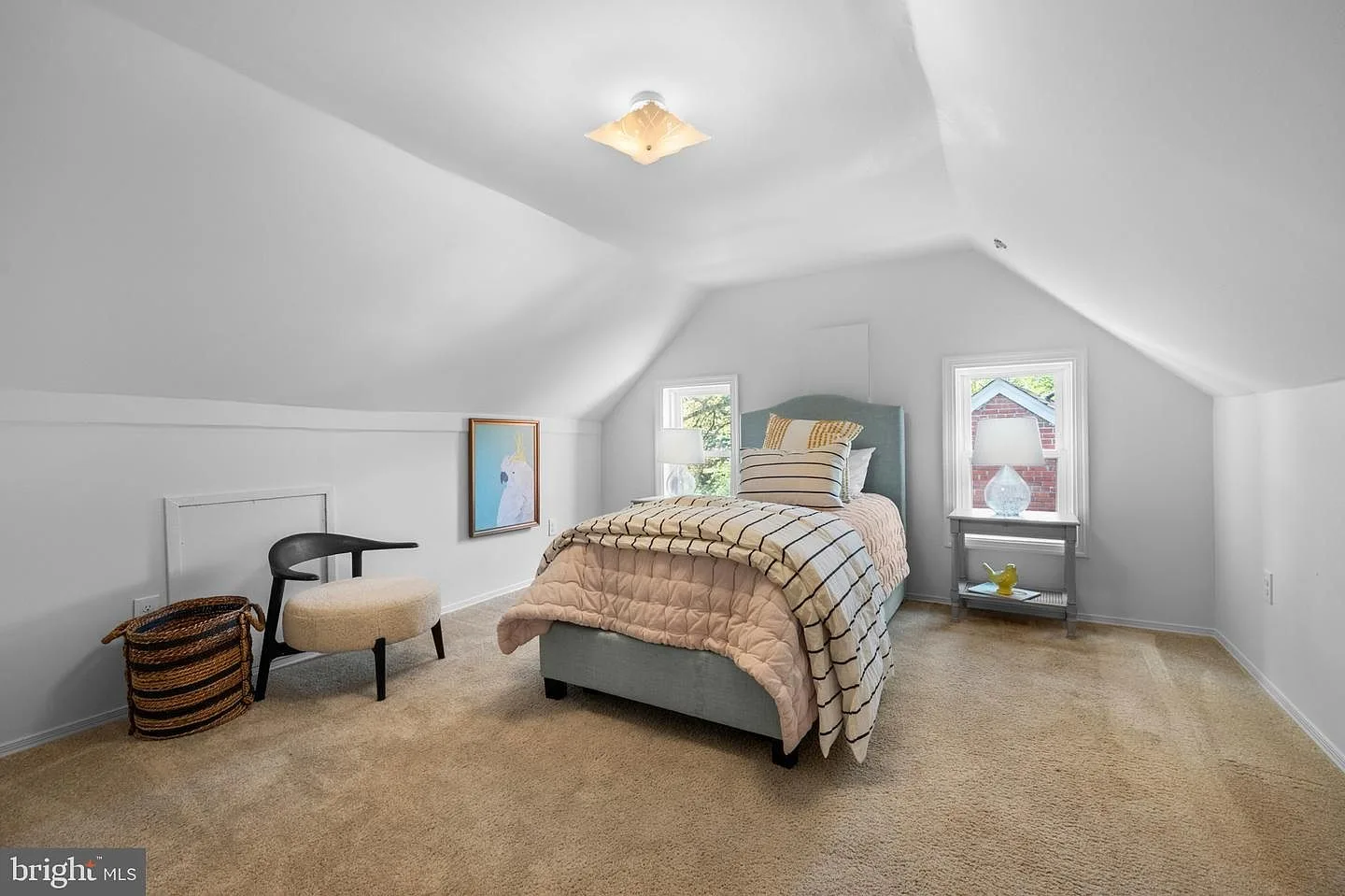 Upstairs guest bedroom under the eaves