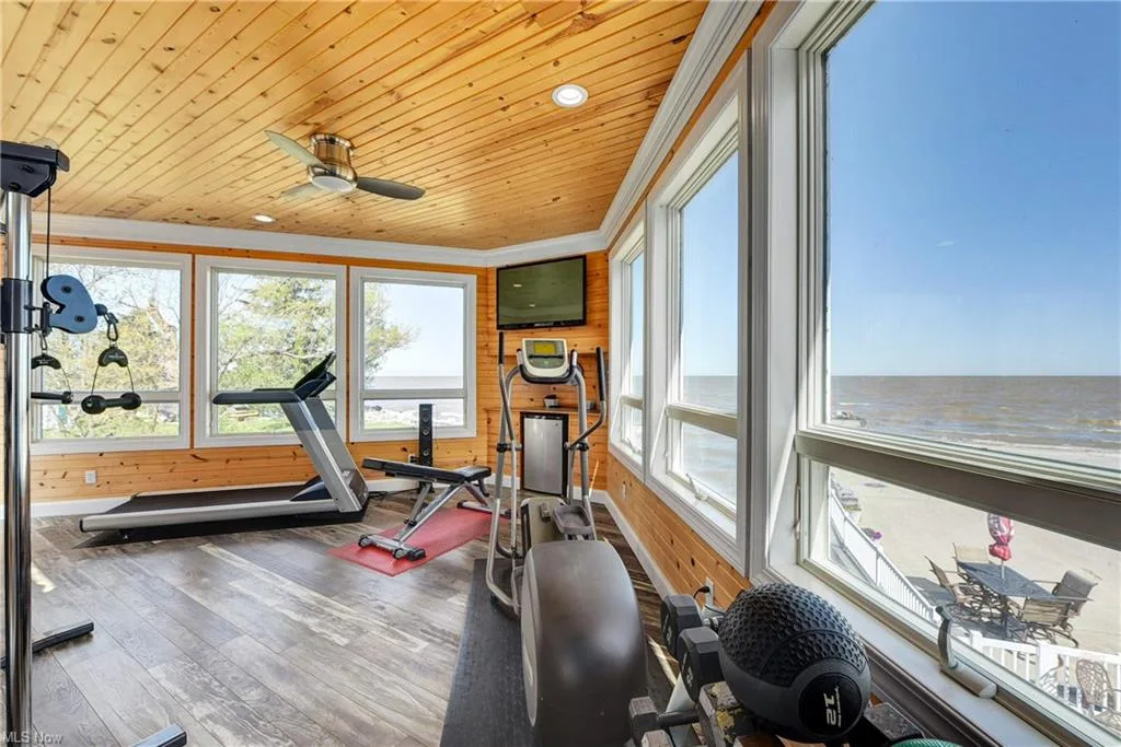 Home gym with lake views at 13005 W Lake Rd in Vermilion, Ohio