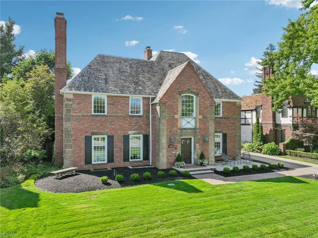 Traditional brick facade of the lakefront home at 21891 Avalon Dr in Rocky River, Ohio