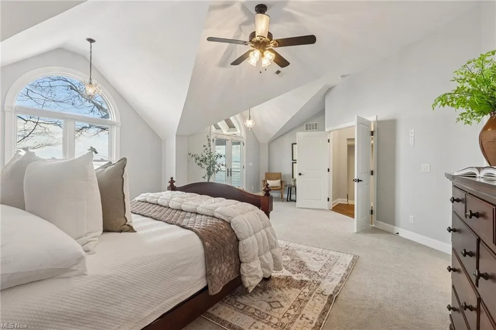 Master bedroom with vaulted ceiling at 31436 Lake Rd in Bay Village, Ohio