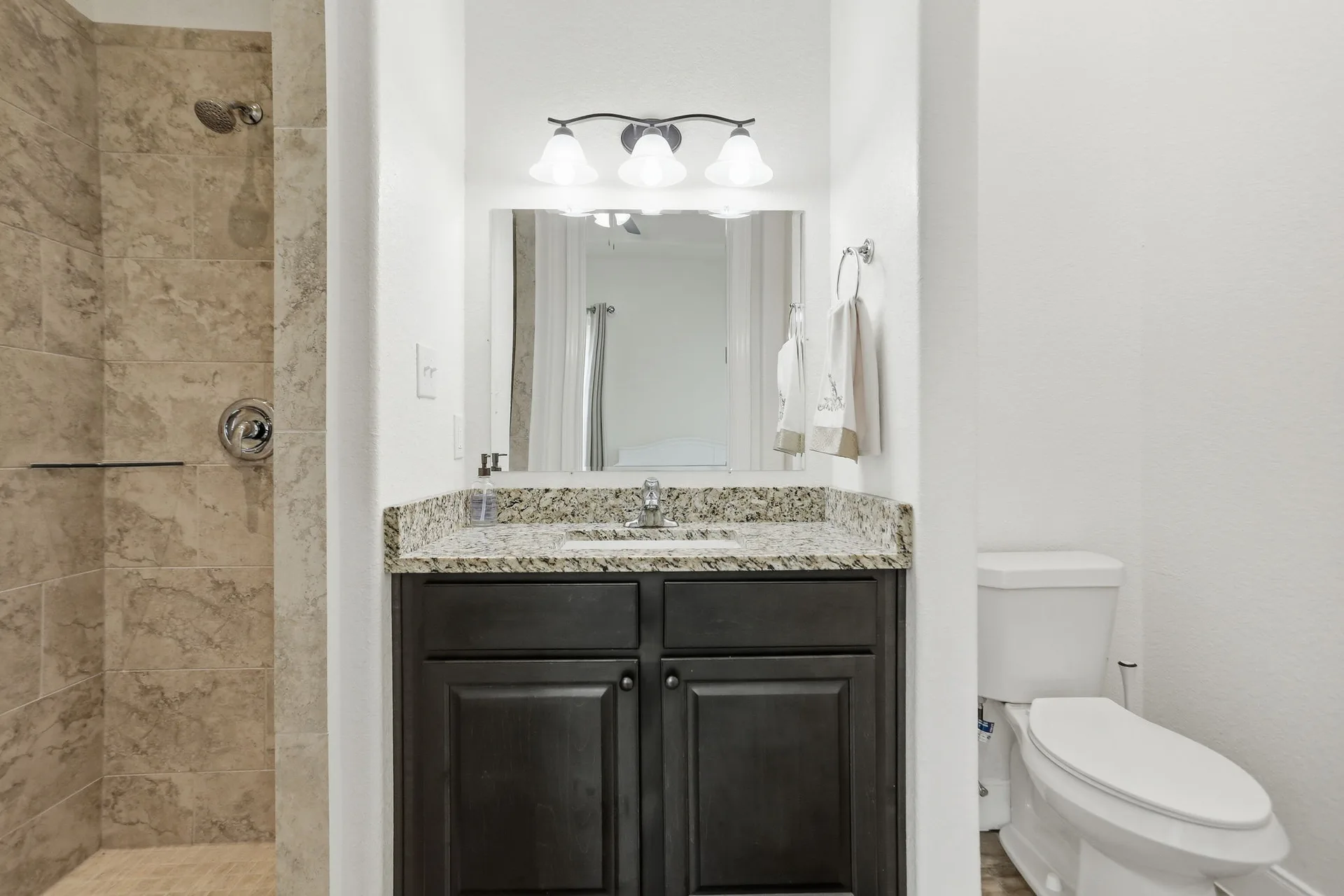Bath with stone-look shower