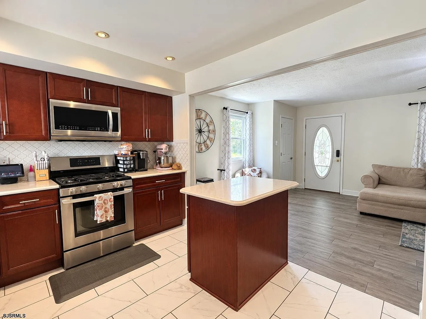 Kitchen and dining opening onto the living area