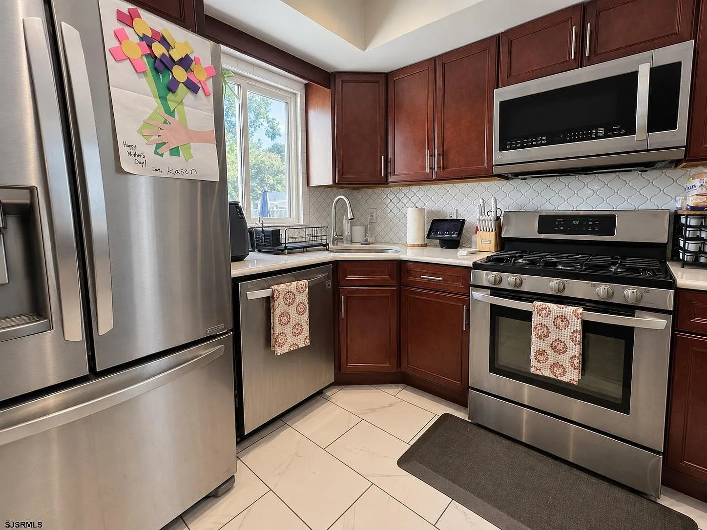 Updated kitchen with stainless steel appliances at 701 Coventry Lane