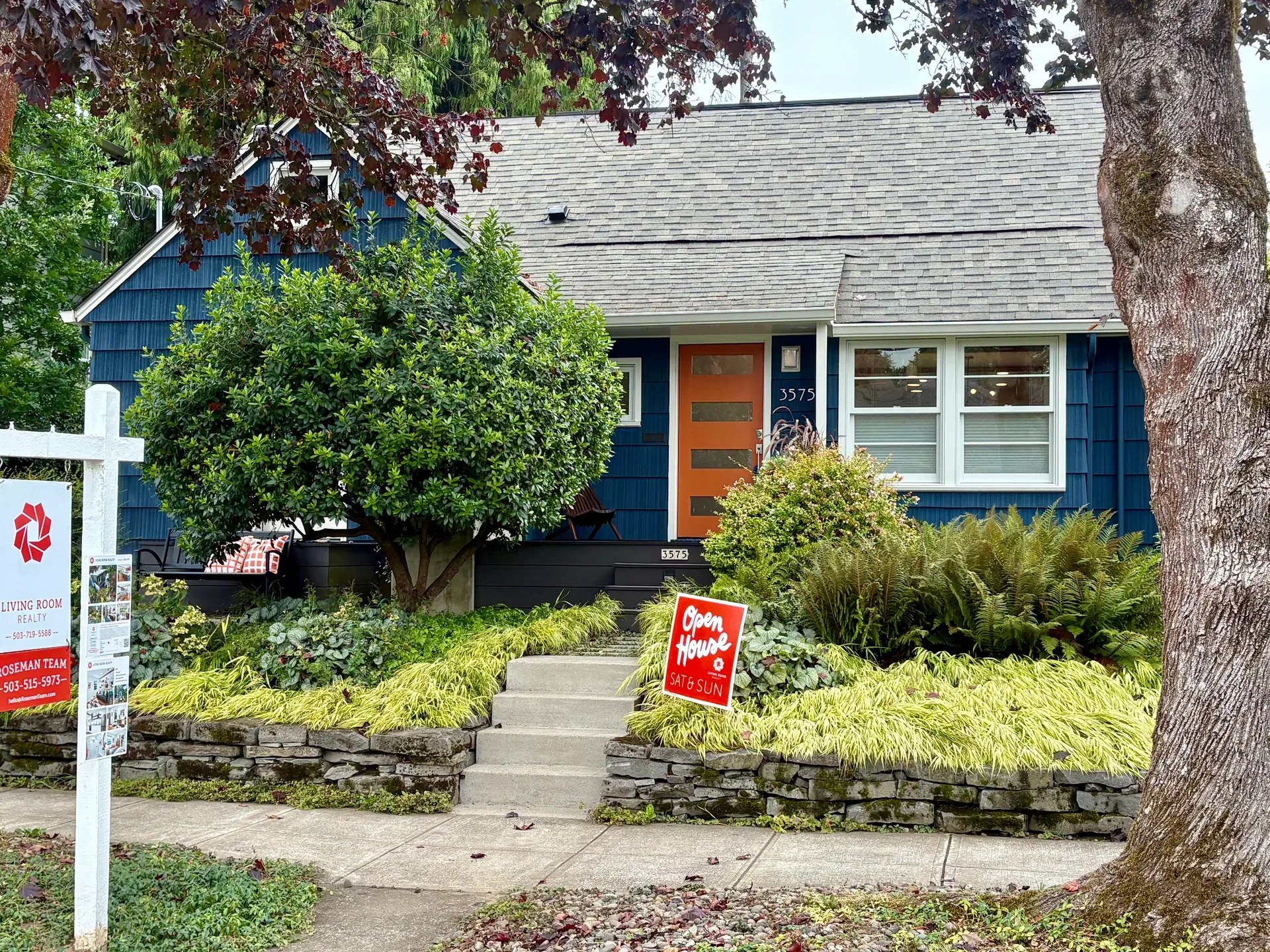 Blue bungalow exterior at 3575 SE Tibbetts St in the Division/Clinton neighborhood