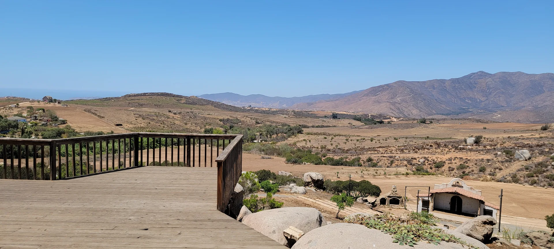 The wood deck of the Hacienda with panoramic views over the ranch near Ensenada