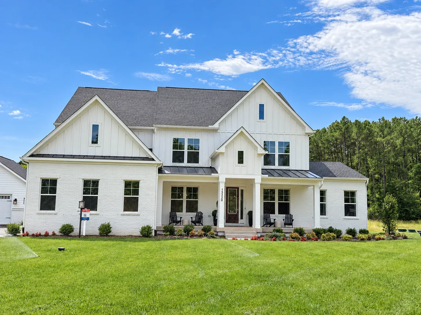 Modern farmhouse facade of a new construction home