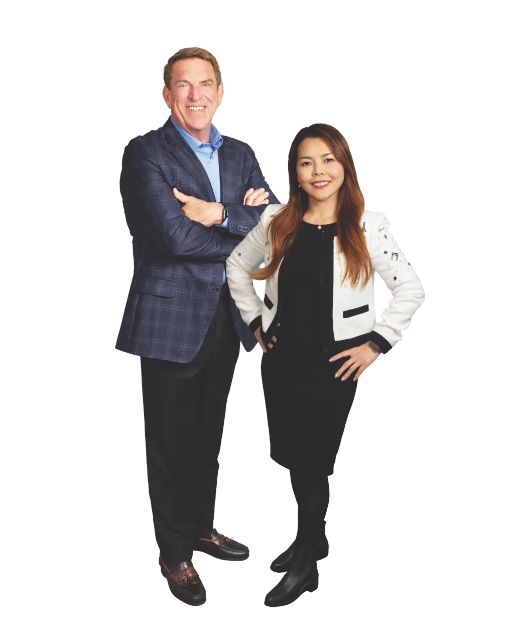 Tim Fiebig with a member of the Fiebig Team, standing in front of a dark background