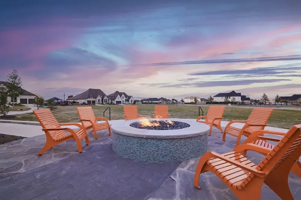 Backyard fire pit at a home in The Ridge at Northlake in Northlake, Texas