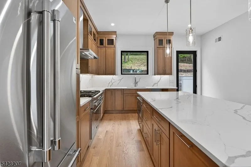 Kitchen island with pendant lights above